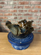 decorative sculpture or planter 
